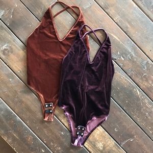 2 faux velvet open back bodysuits